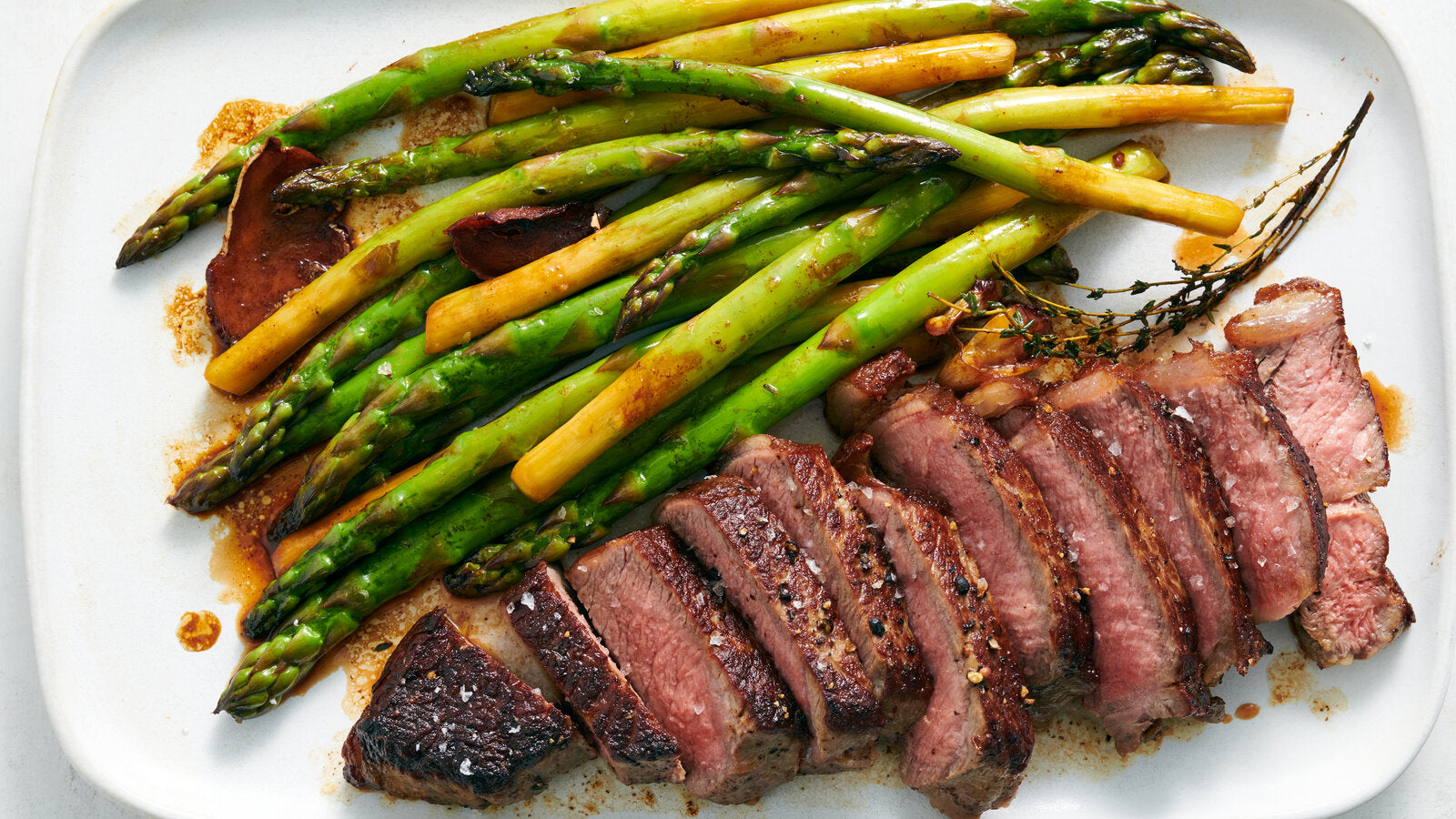 Master the Art of Pellet Grill Perfection: Umami Bomb Ribeye Honey Butter Asparagus