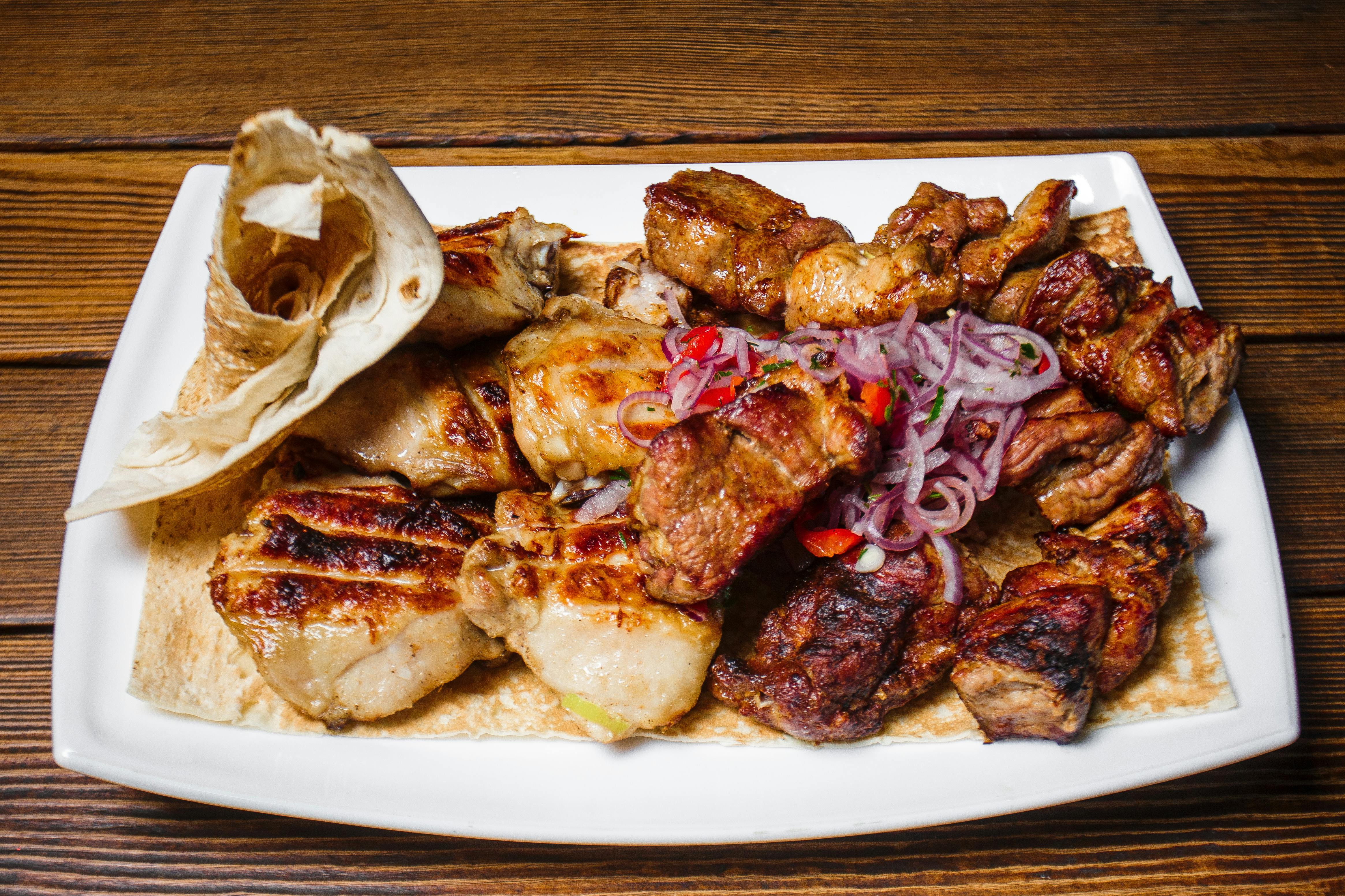 Herb-Infused Roasted Chicken with Caramelized Onions